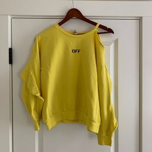Bright yellow cut-out pullover